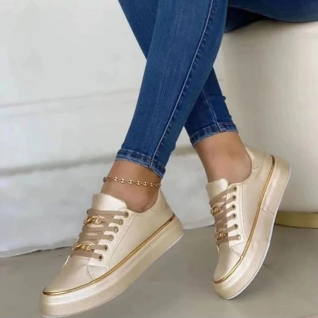 Damskie eleganckie sneakersy ze złotym detalem